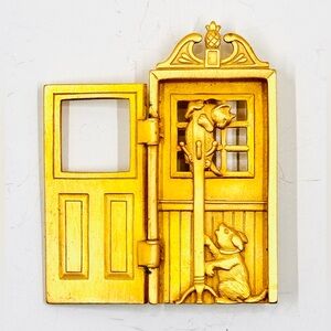 JJ Jonette Gold Tone Dog Chasing Cat Behind The Articulated Door Brooch